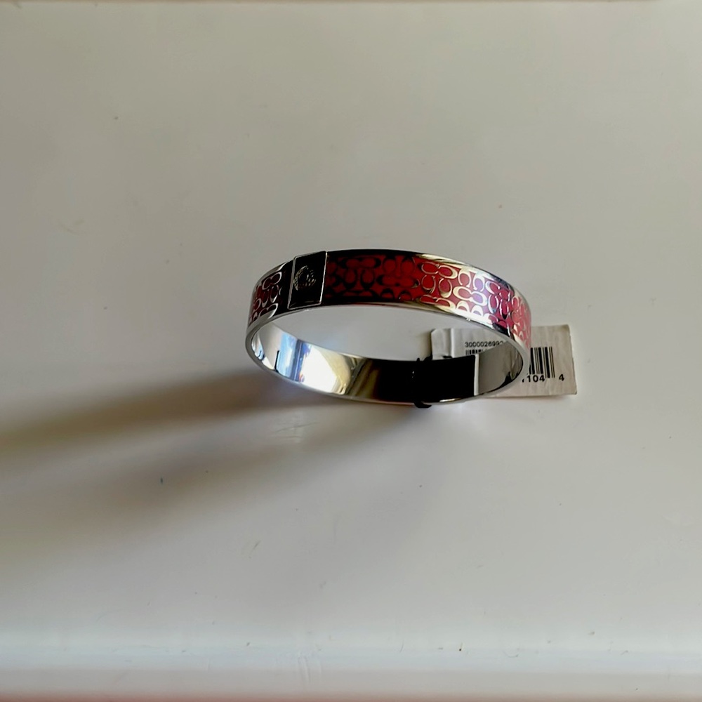 Pink coach bangle  never worn  avg size